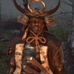 Assassin's Creed Shadows Twitch Drops - An upper-body shot of Yasuke standing in a battlefield at night, lit by a fire.